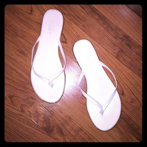 white fancy flip flops